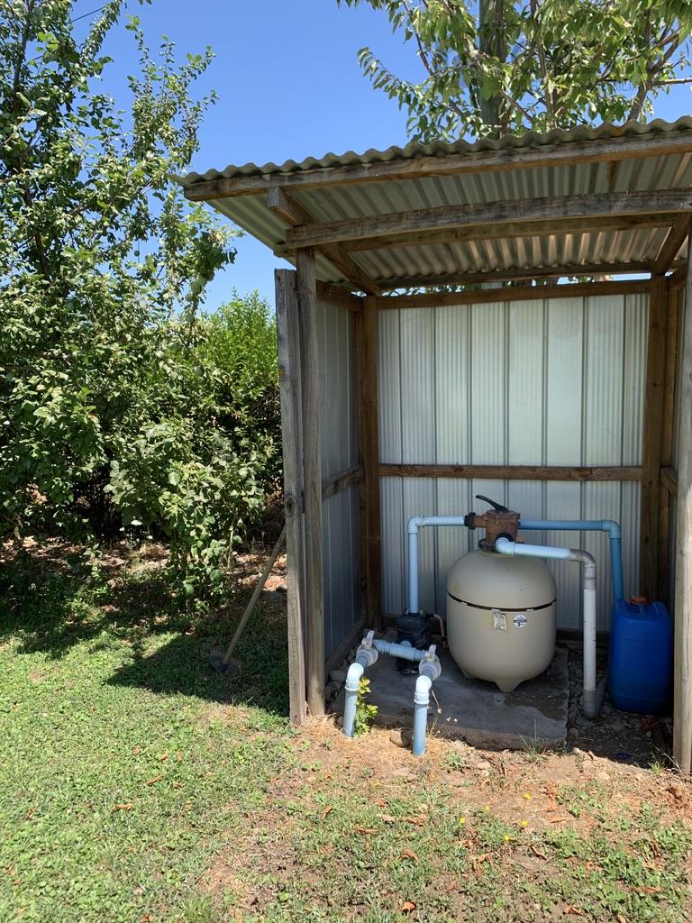 CASA CON PISCINA MÁS PARCELA DE 1,5 HECTÁREAS - Crece corredor de
